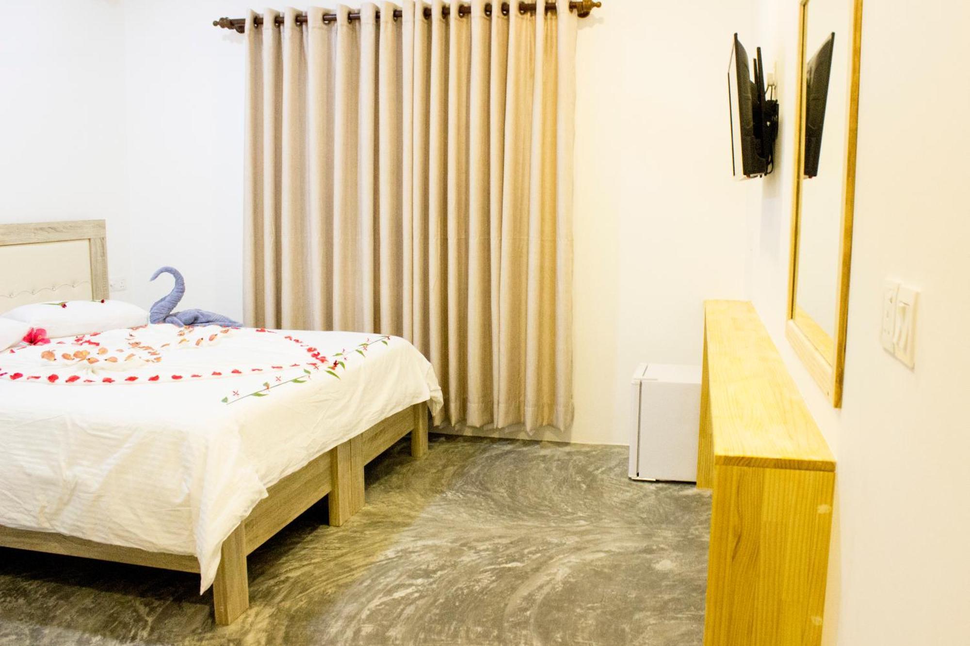 Standard Doppel- oder Zweibettzimmer mit Gartenblick