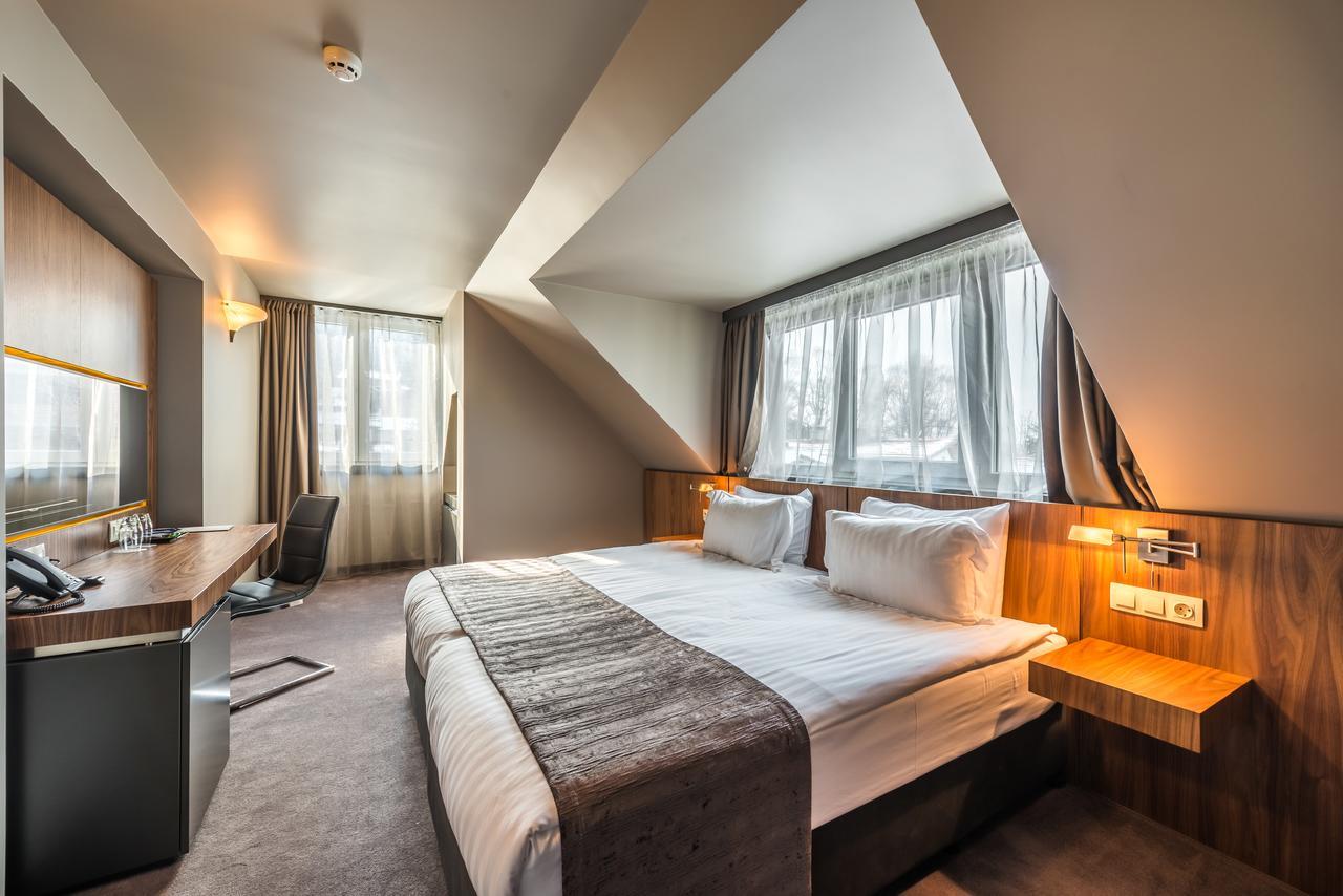 Deluxe Dreibettzimmer mit kostenfreiem Parkplatz