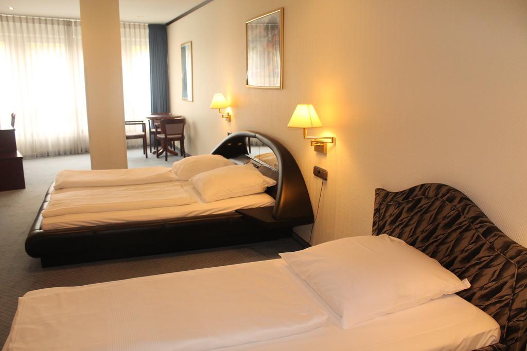 Dreibettzimmer