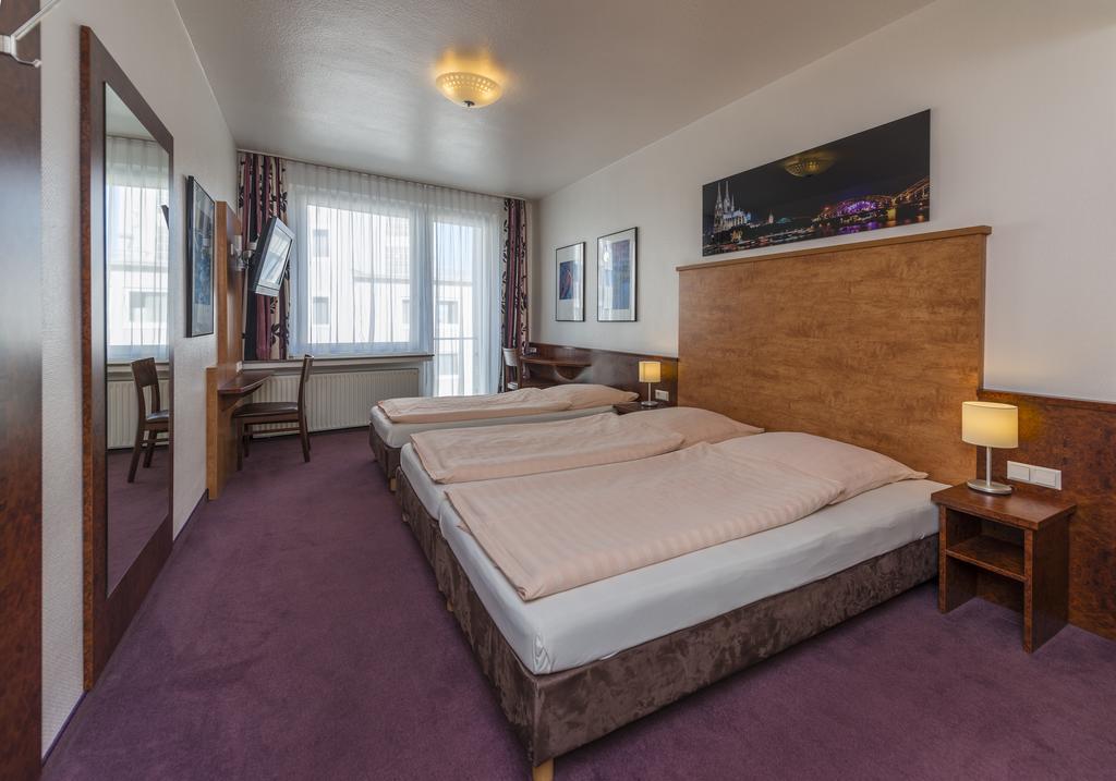 Dreibettzimmer