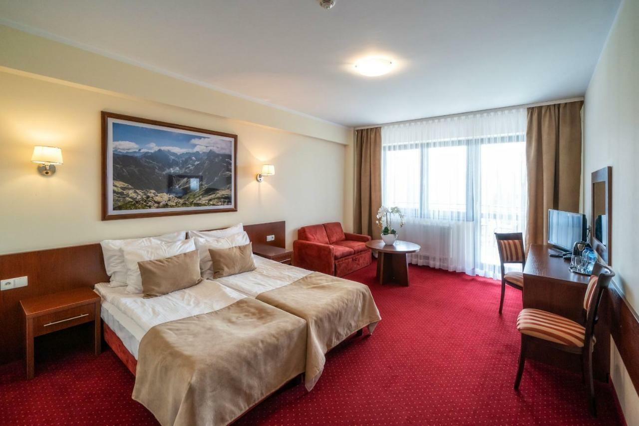 Comfort Doppelzimmer mit Sofa und Balkon