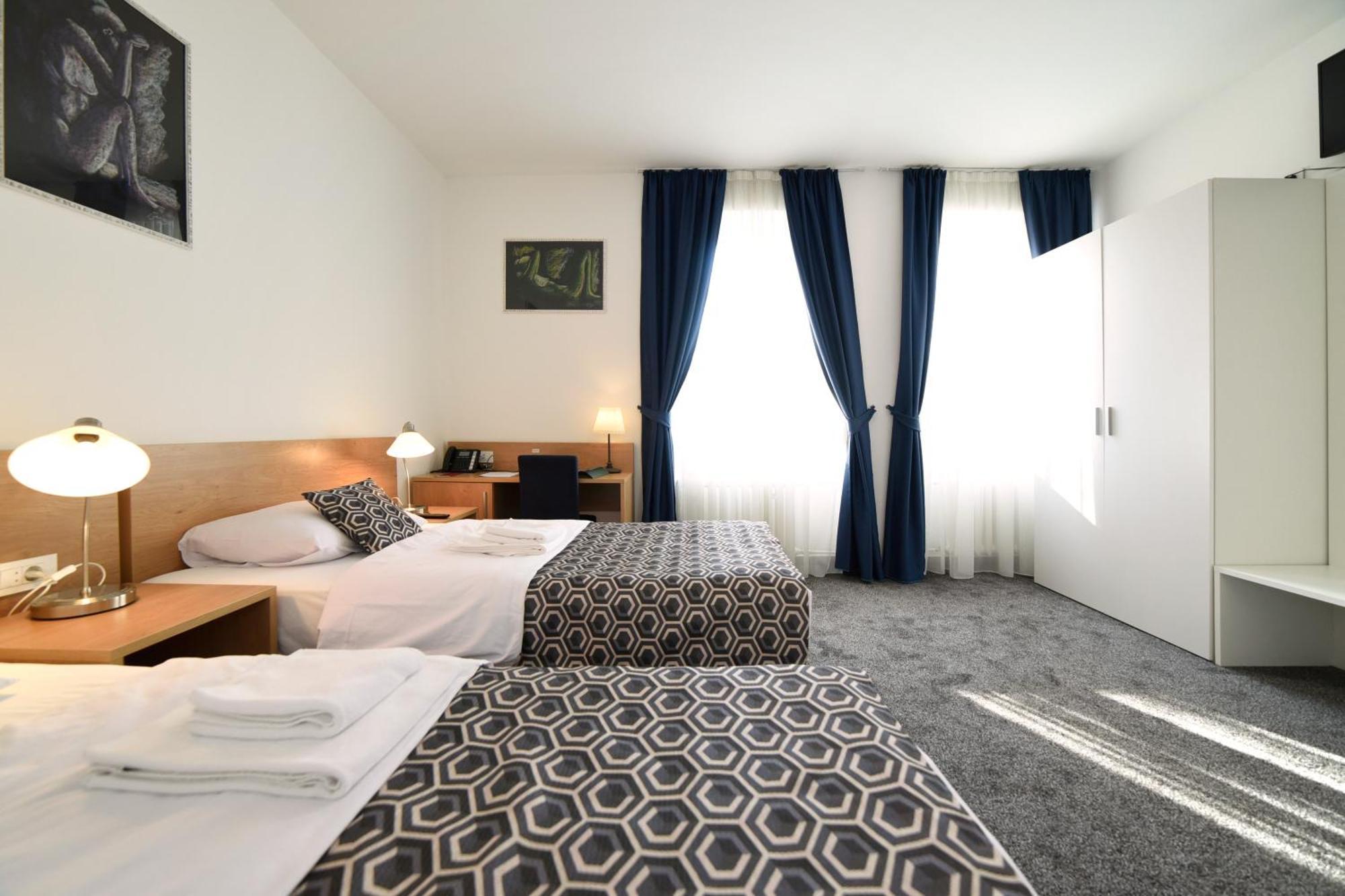 Dreibettzimmer