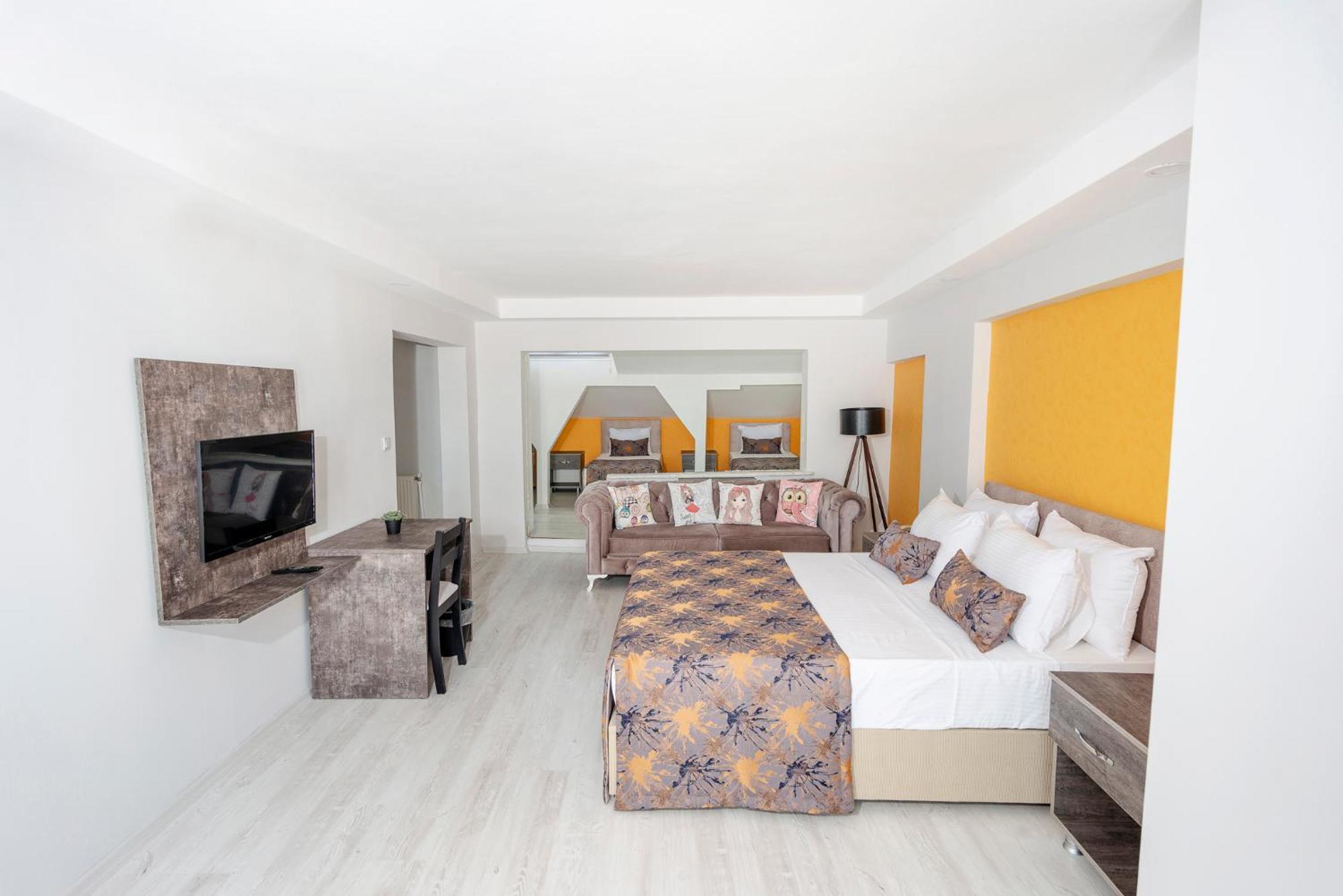 Suite mit Kingsize-Bett und Balkon