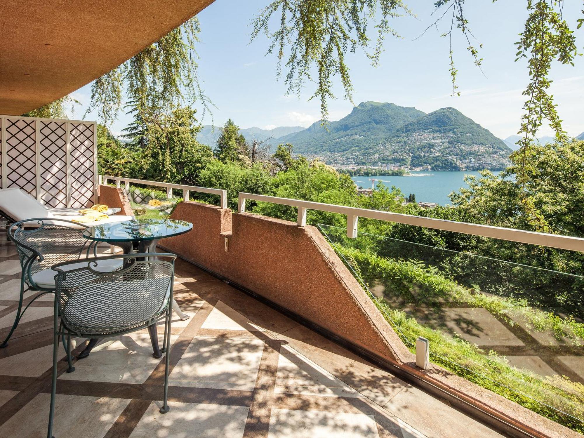 Signature Suite mit Balkon mit Seeblick und eigenem Zugang zum Spa