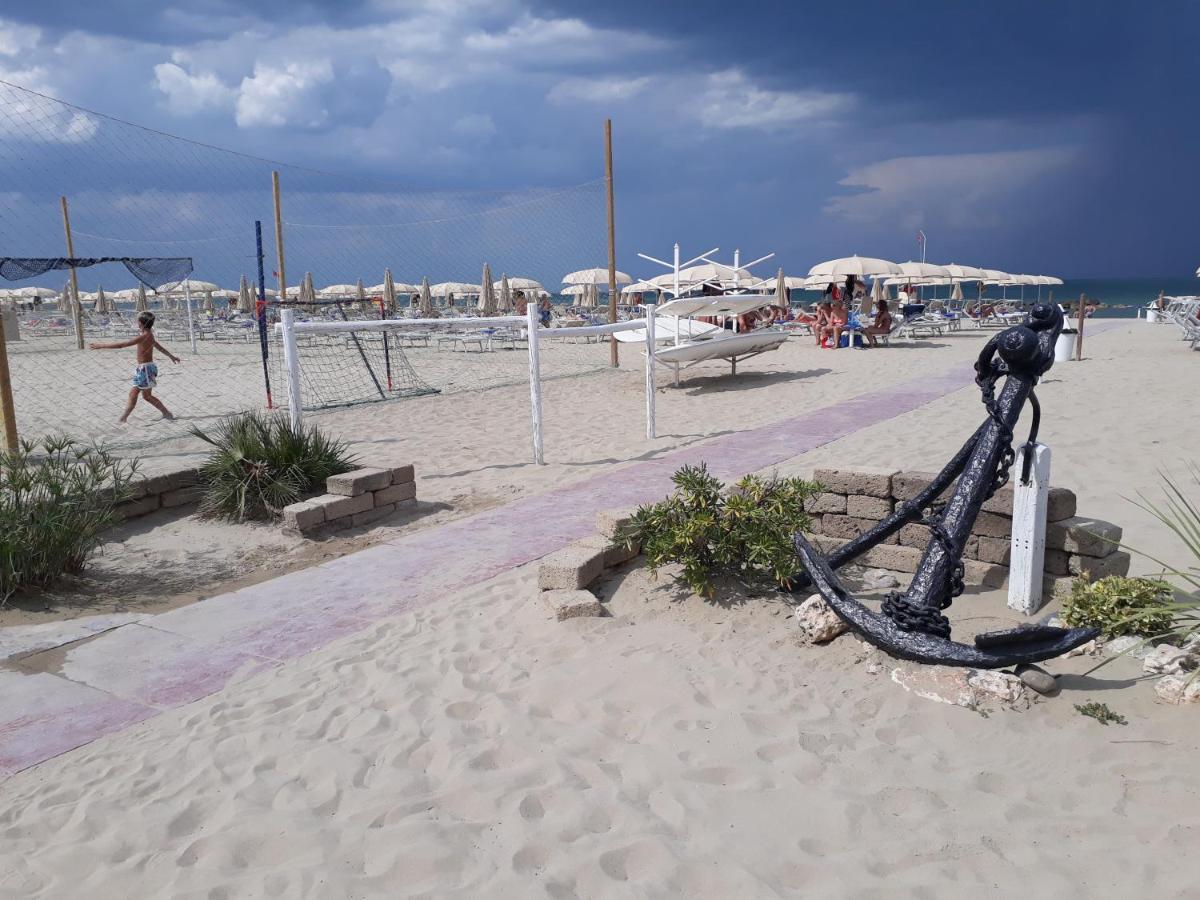 Dreibettzimmer mit Zugang zum Strand