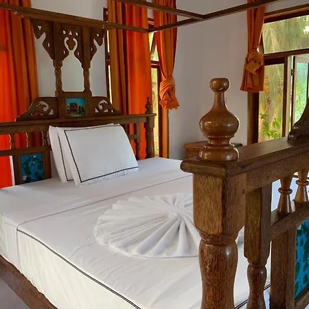 Asante Sana Beach Cottages-2