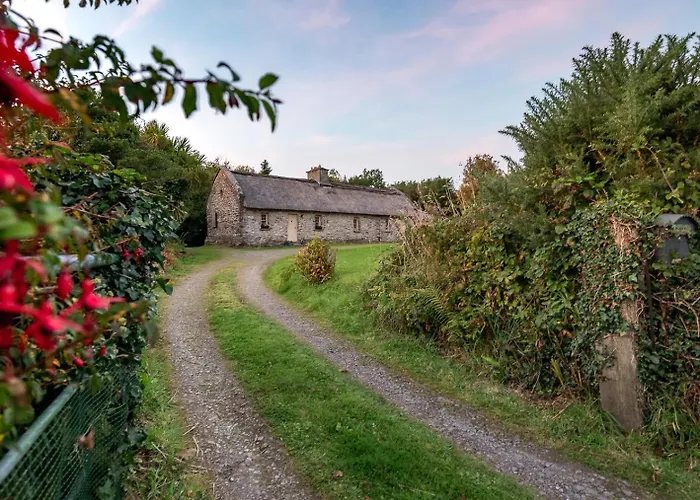 Traditional Style Thatched Cottage In Kenmare