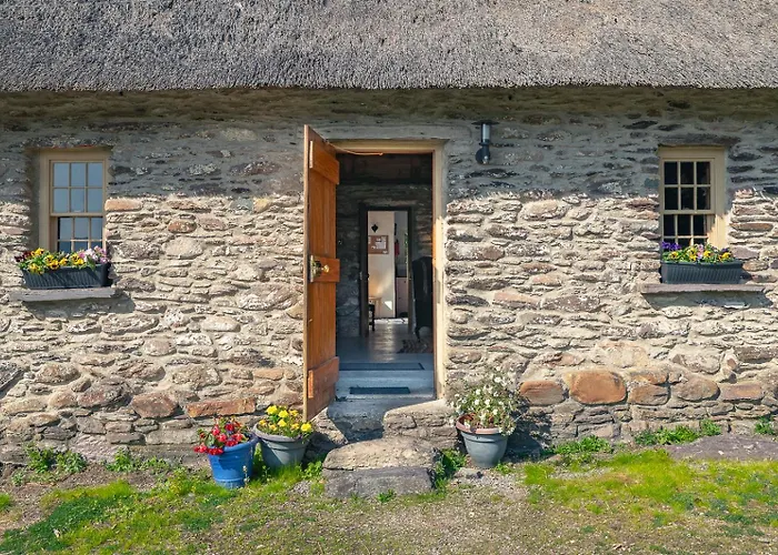 Traditional Style Thatched Cottage In Kenmare