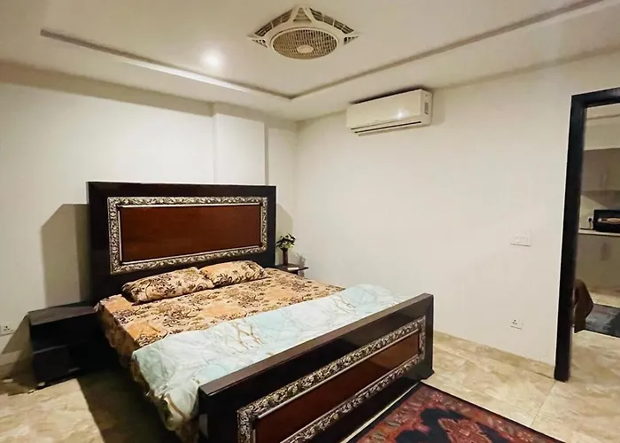 Furnished Apparment Eiffel Tower Bahria town Lahore Dargai 